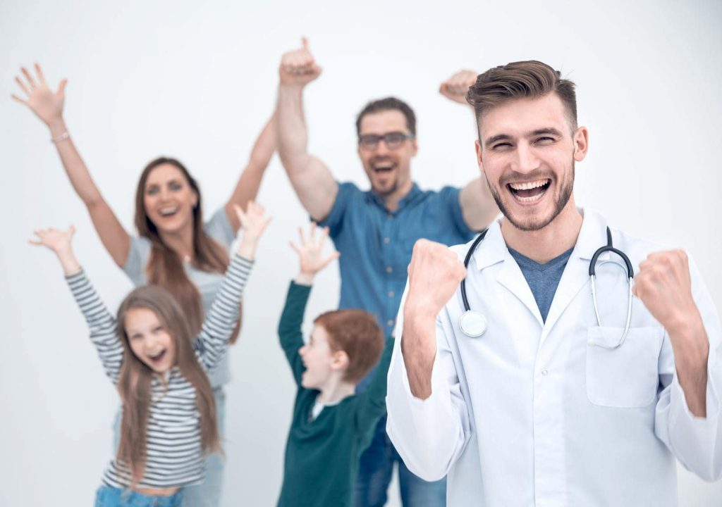 happy family with their family doctor